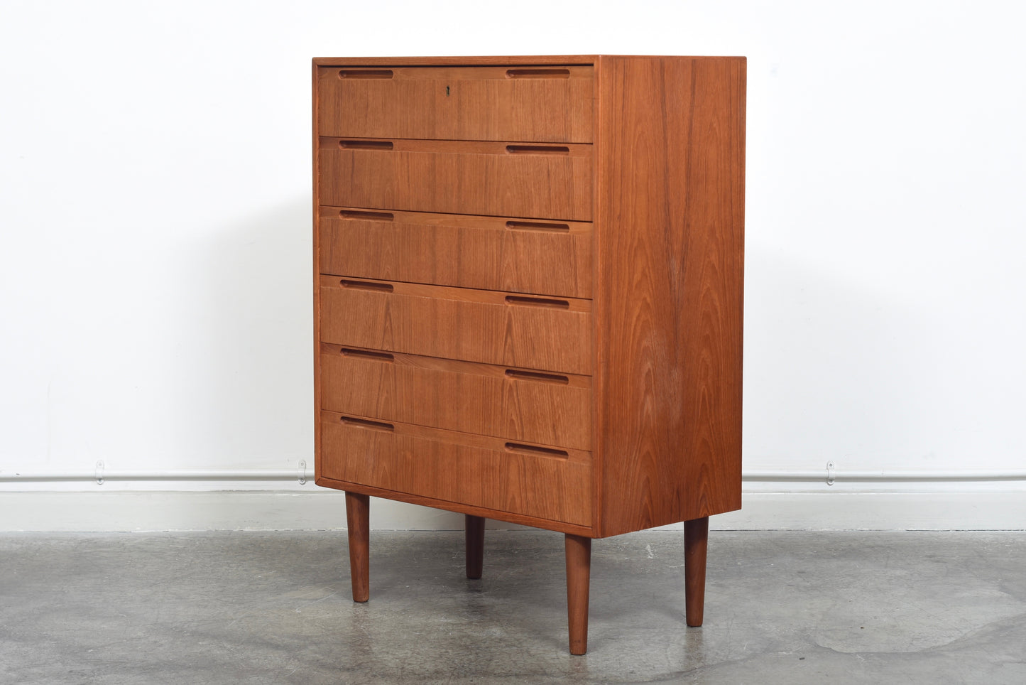 Chest of six drawers with inset handles