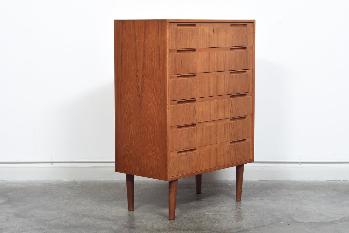 Chest of six drawers with inset handles