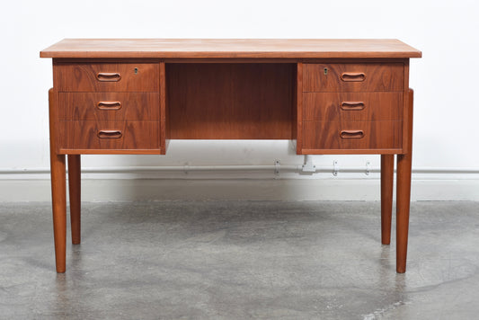 Teak desk with twin pedestals