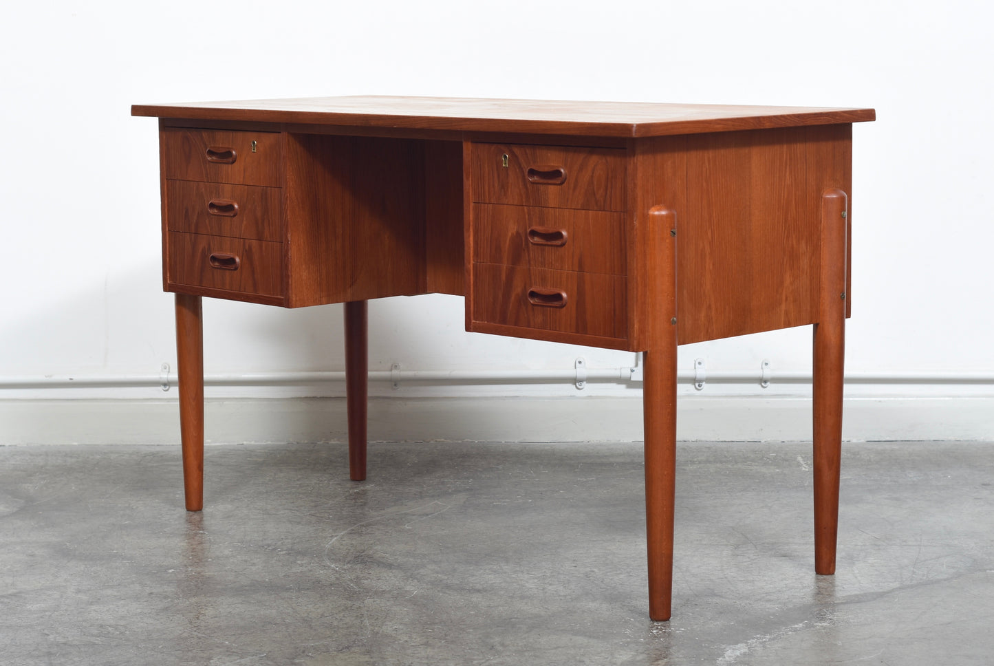 Teak desk with twin pedestals