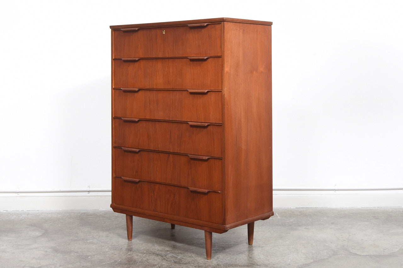 Large chest of drawers in teak with lipped handles
