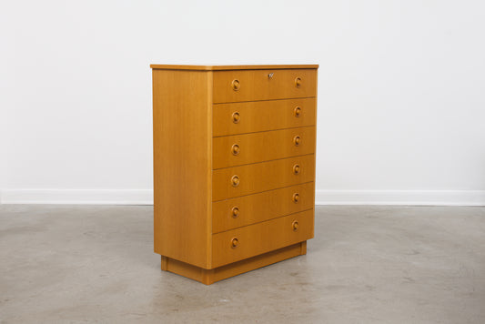 1970s oak chest of drawers on plinth base