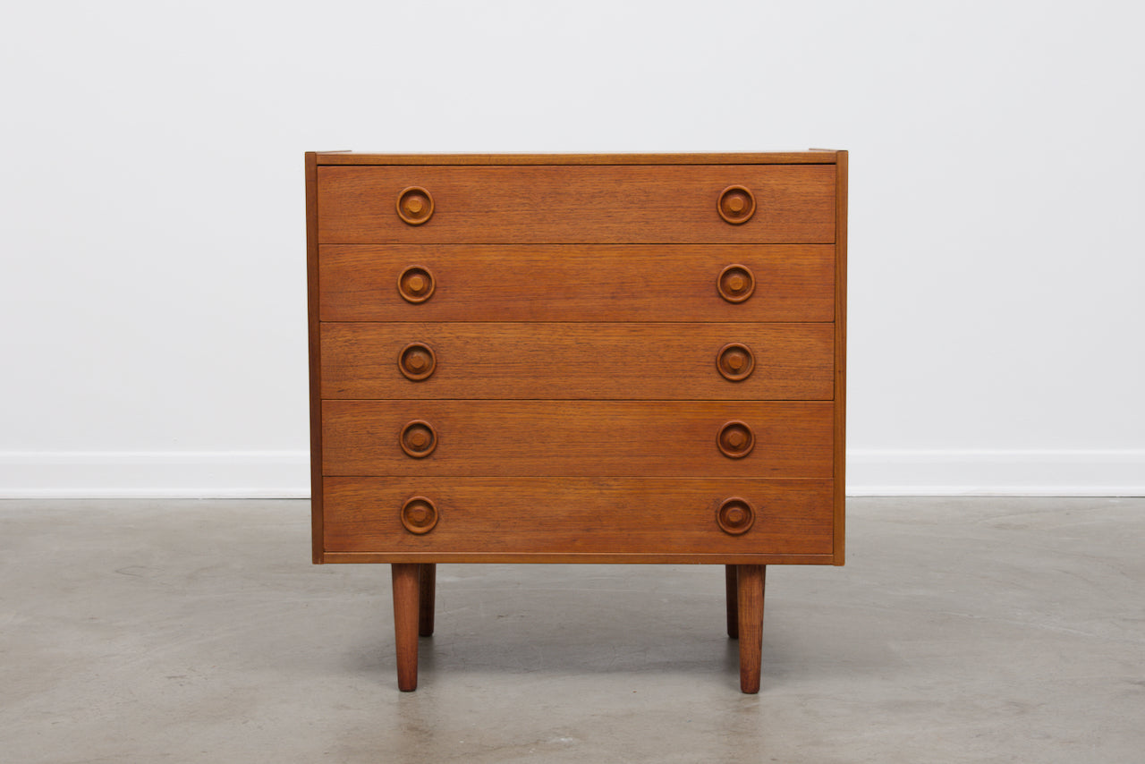 Short teak chest of five drawers