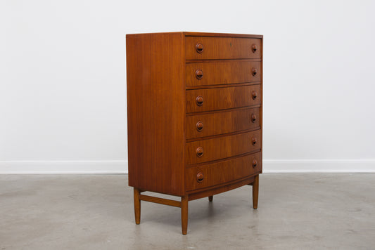 Bow-fronted chest of six drawers in teak