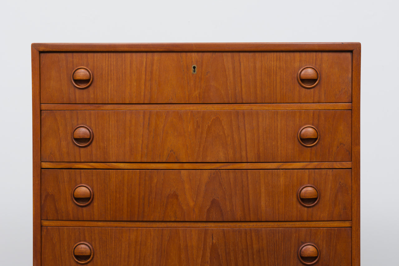 Bow-fronted chest of six drawers in teak
