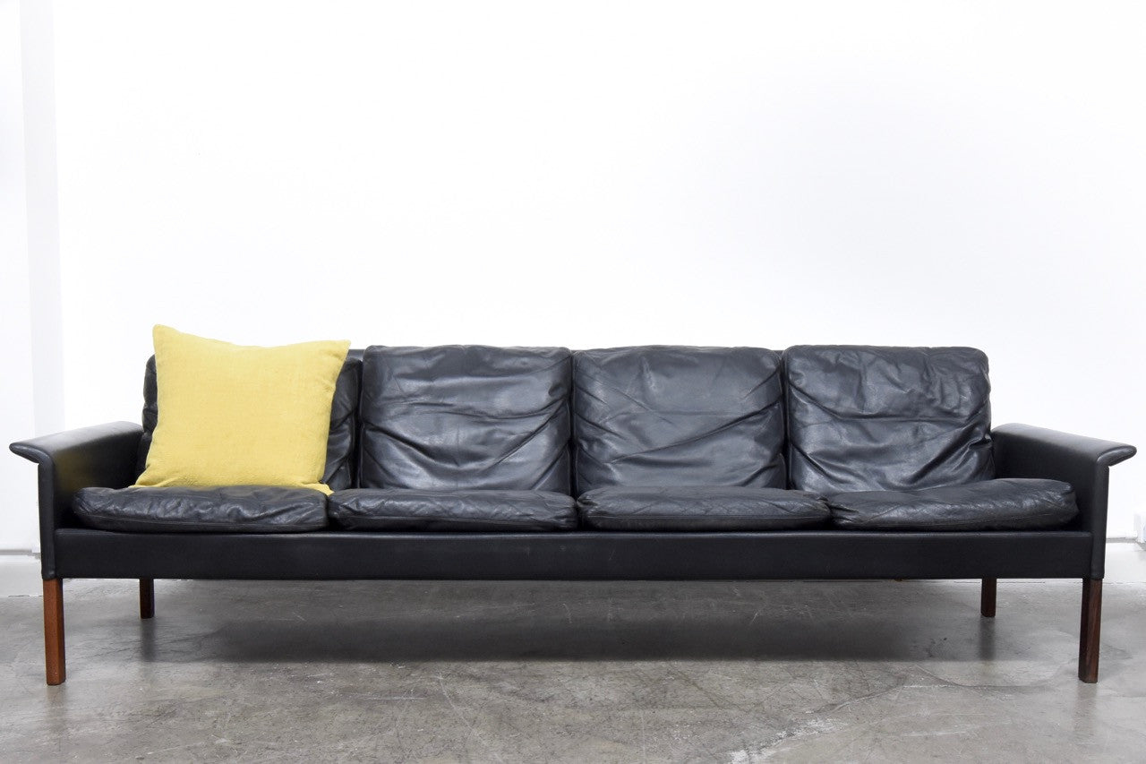 Four seat leather sofa by Hans Olsen