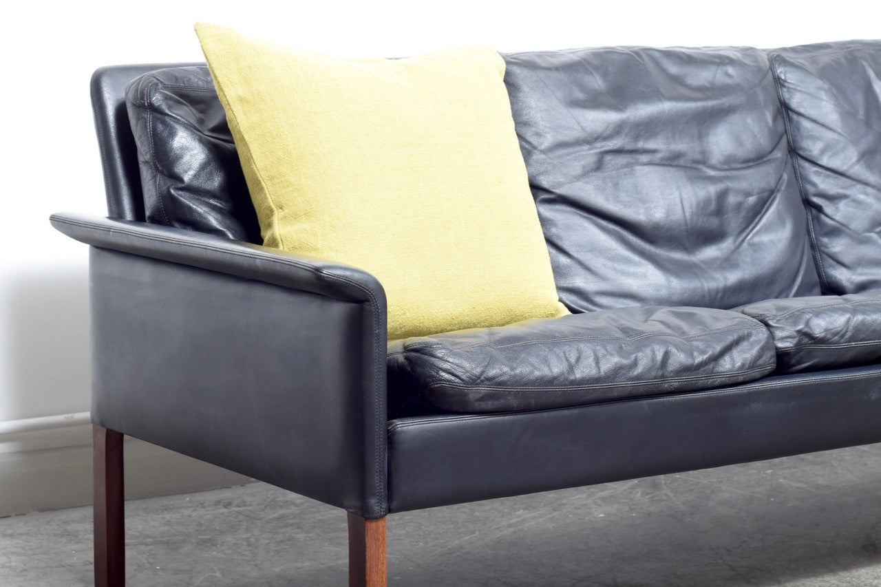 Four seat leather sofa by Hans Olsen