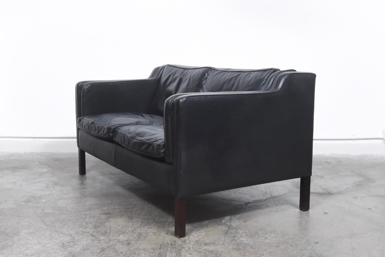 Black leather two seater by Stouby