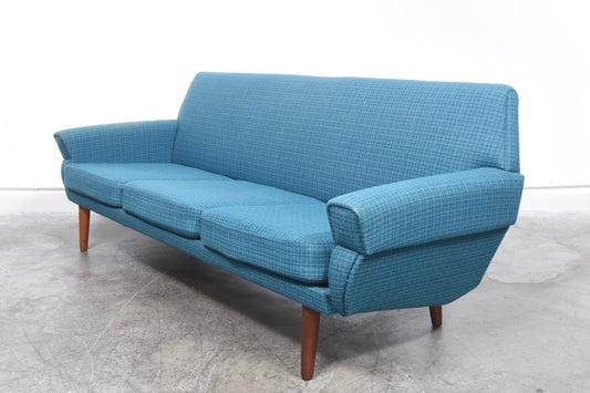 Three seat sofa in wool