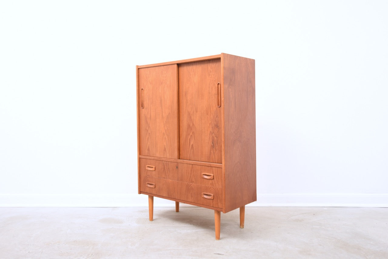 Teak storage cabinet