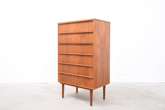 Narrow teak chest of six drawers