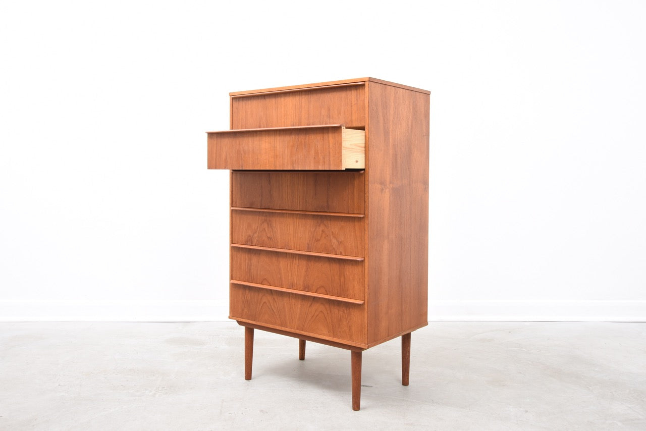 Narrow teak chest of six drawers