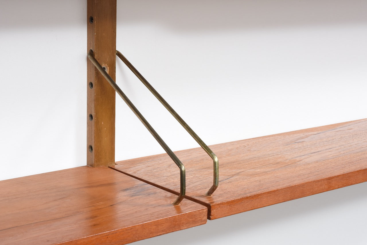 Vintage teak modular shelving by Poul Cadovius