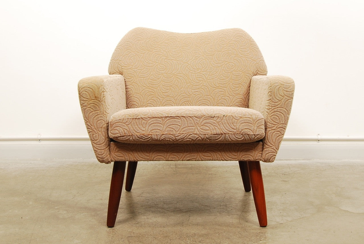 1950s lounge chair on teak legs
