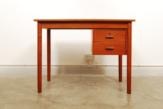 Single pedestal desk in teak