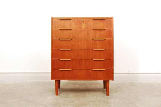 Teak chest of six drawers with lipped handles