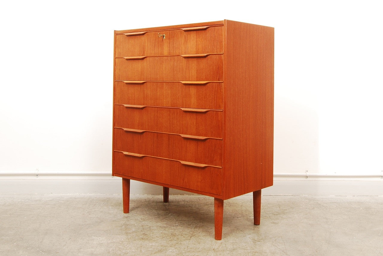 Teak chest of six drawers with lipped handles