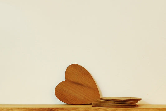 Heart shaped teak coasters