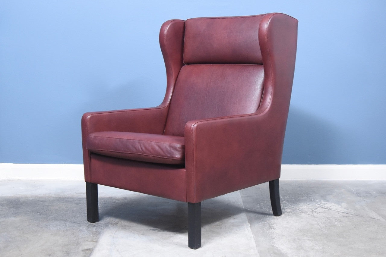 High back dark maroon lounge chair