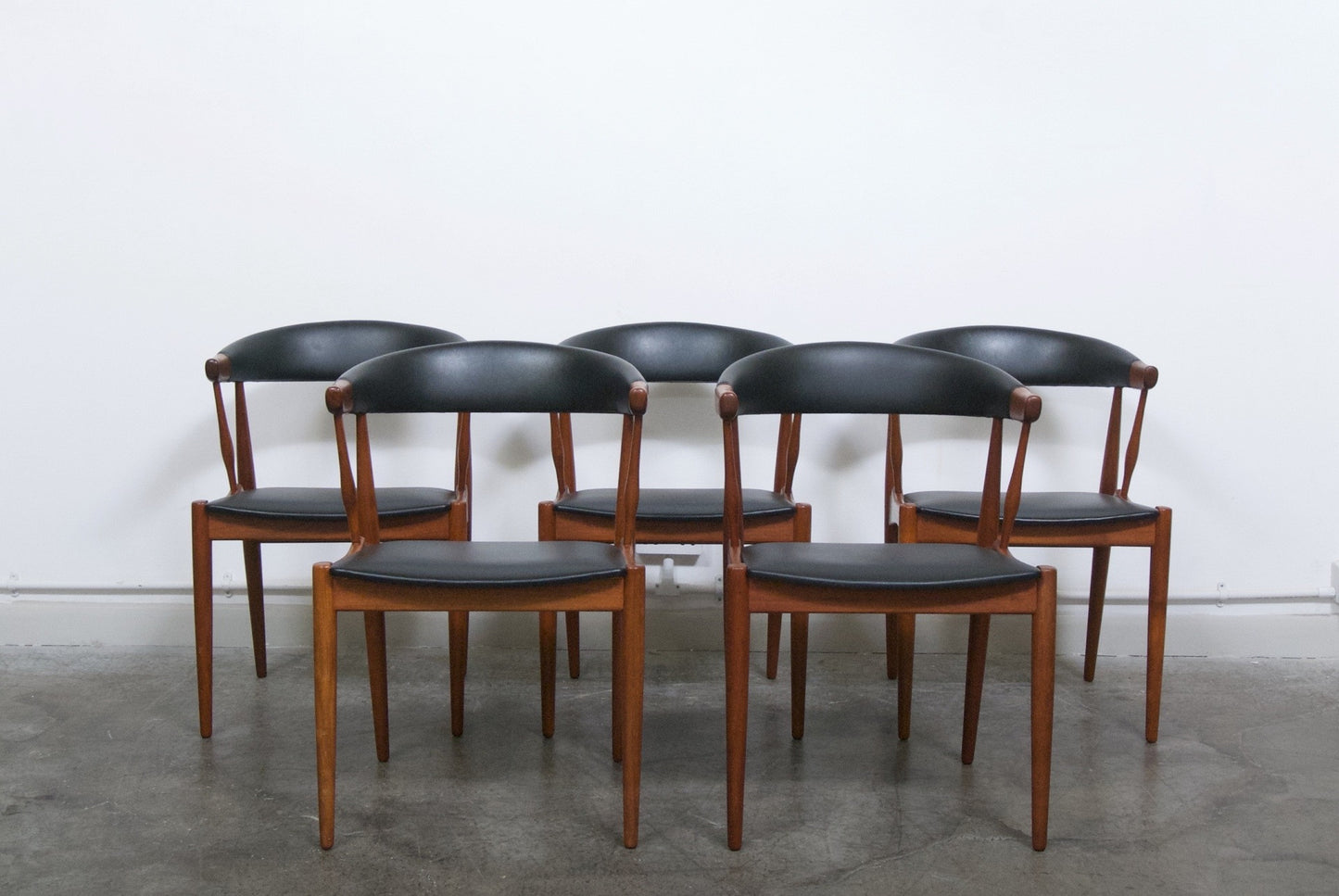 Set of five teak dining chairs