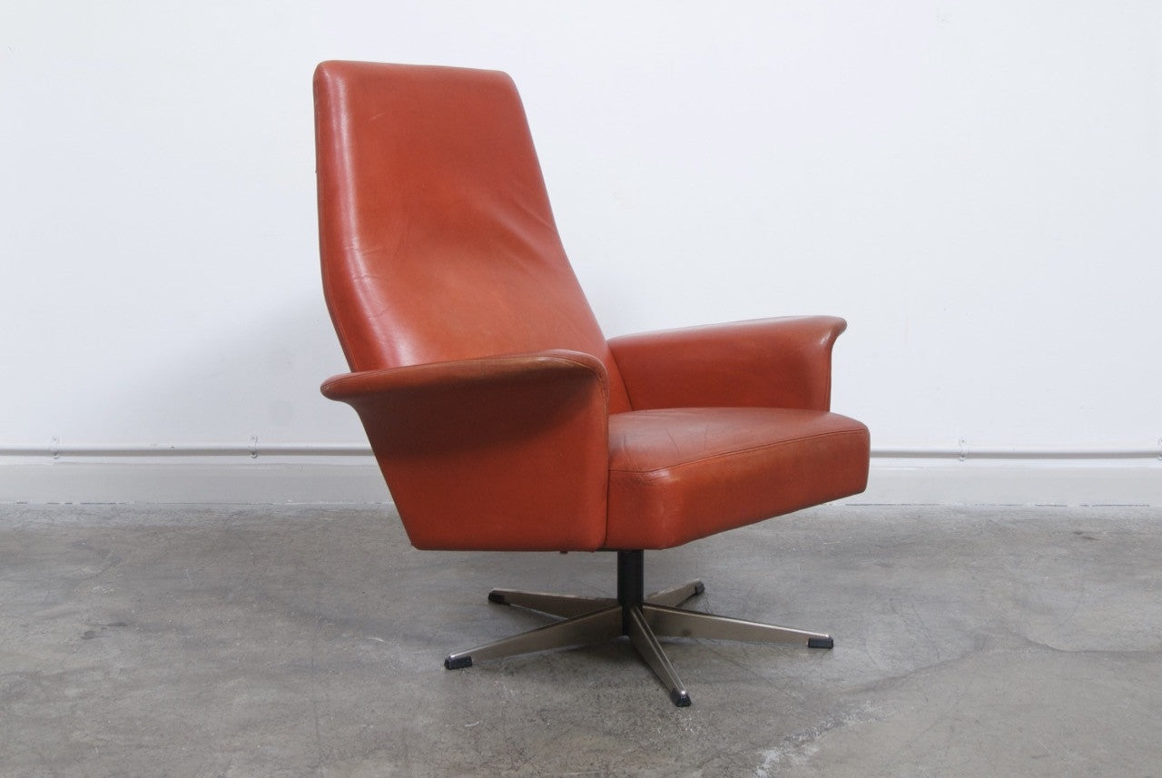 High back swivel chair w/ winged armrests