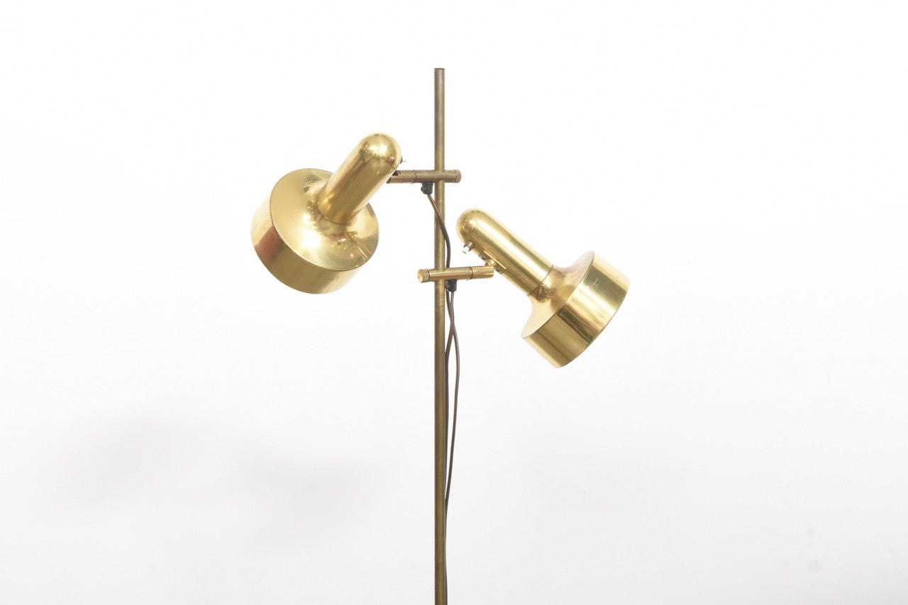 Twin headed brass floor lamp