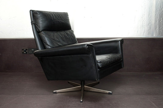 High back leather lounger on chrome swivel base