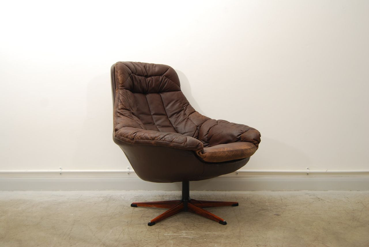 Leather bucket chair by H.W. Klein