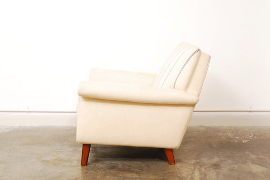 Beige wool lounge chair