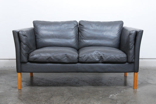 Two seat grey leather sofa