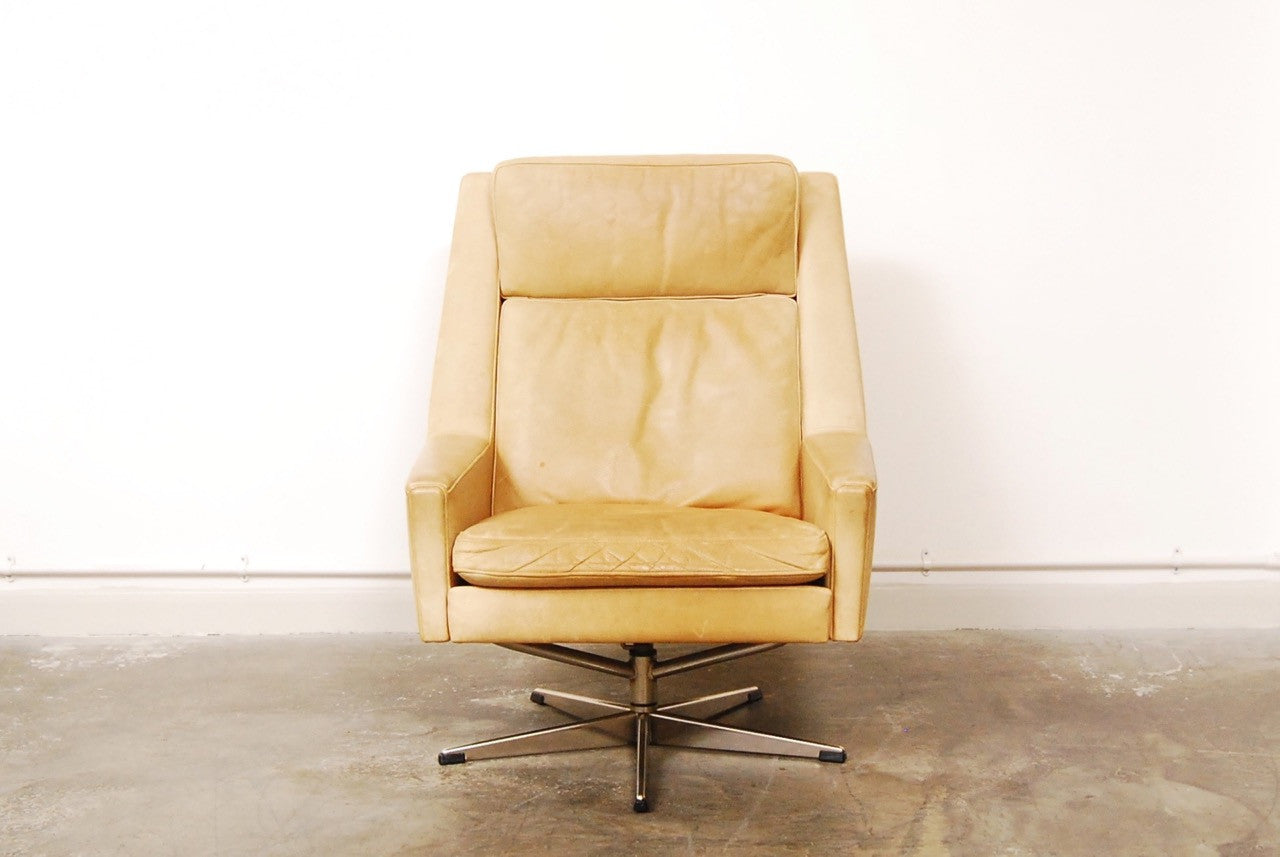 High back lounger in cream leather