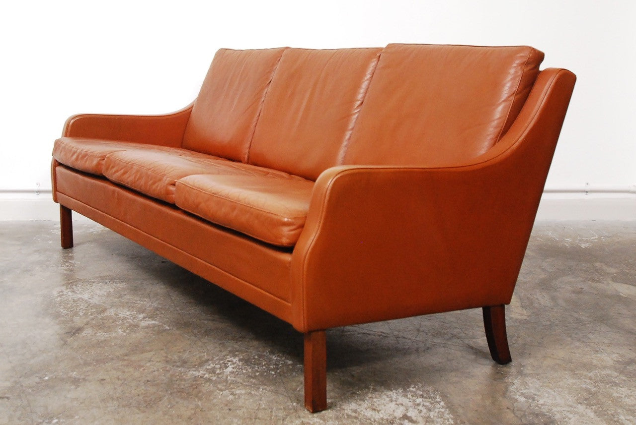 Three seat cognac leather sofa