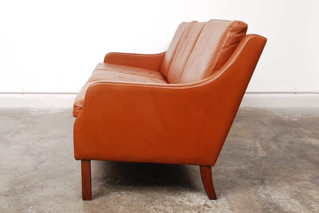 Three seat cognac leather sofa