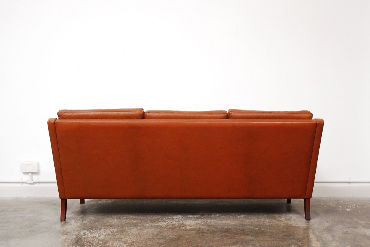 Three seat cognac leather sofa