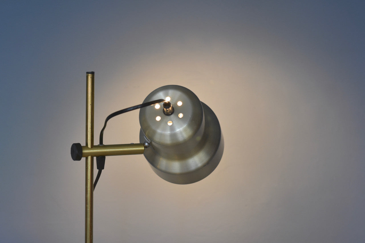 Twin-headed floor light in brass