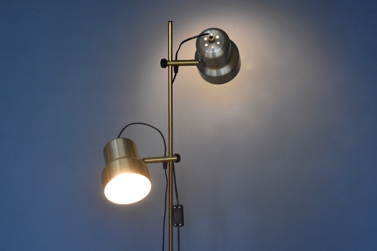 Twin-headed floor light in brass