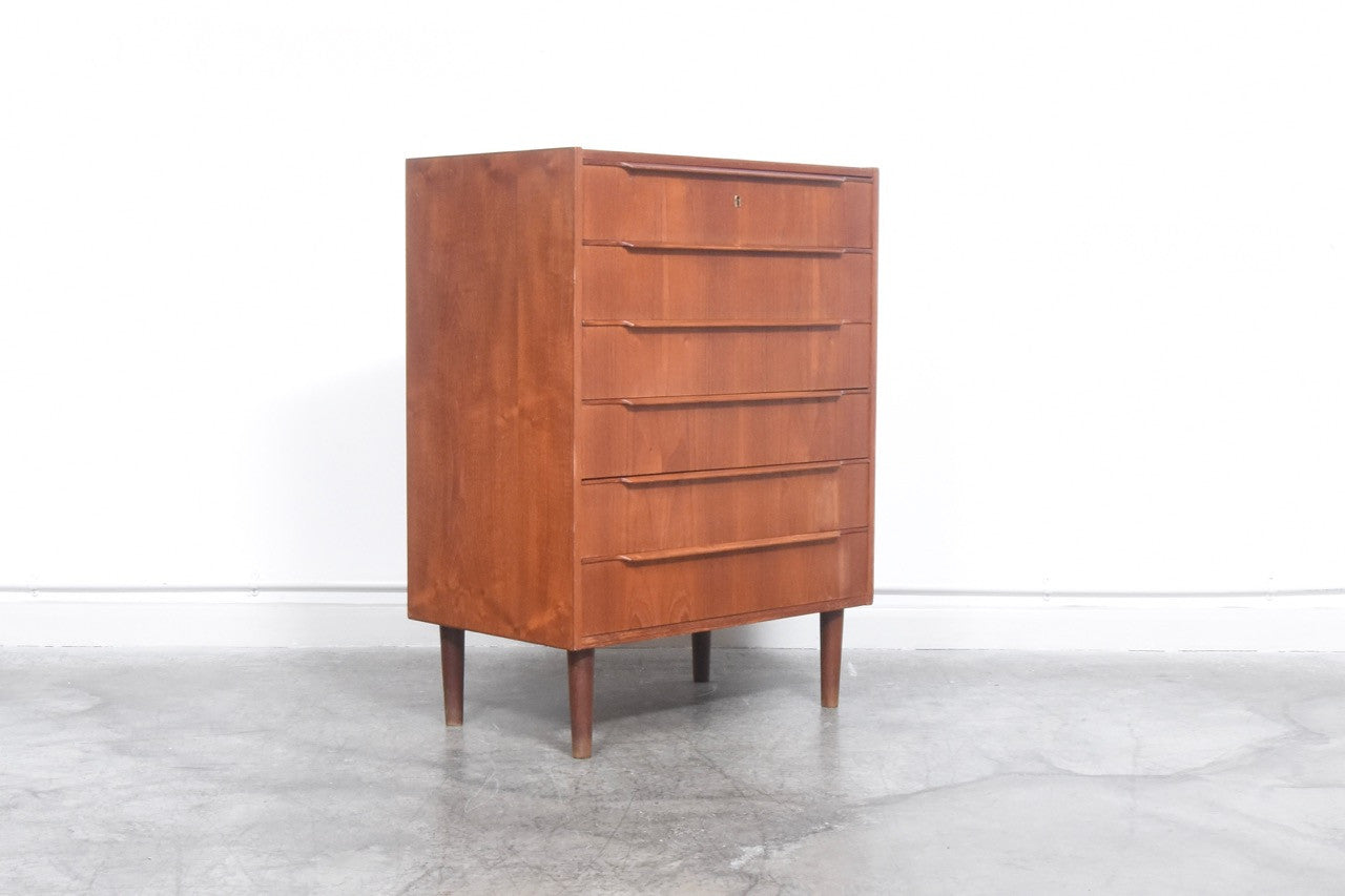 Teak chest of drawers with lipped handles