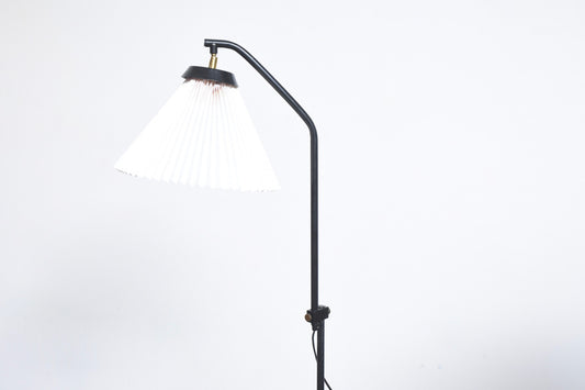 Height adjustable floor lamp by Le Klint