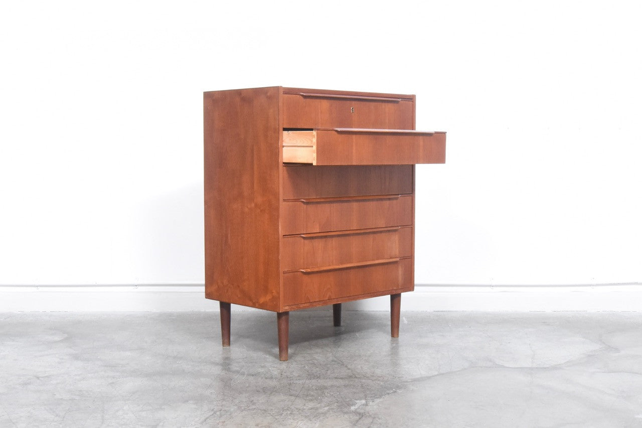 Teak chest of drawers with lipped handles