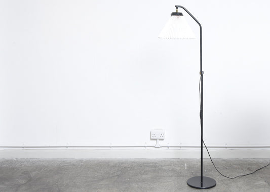 Height adjustable floor lamp by Le Klint