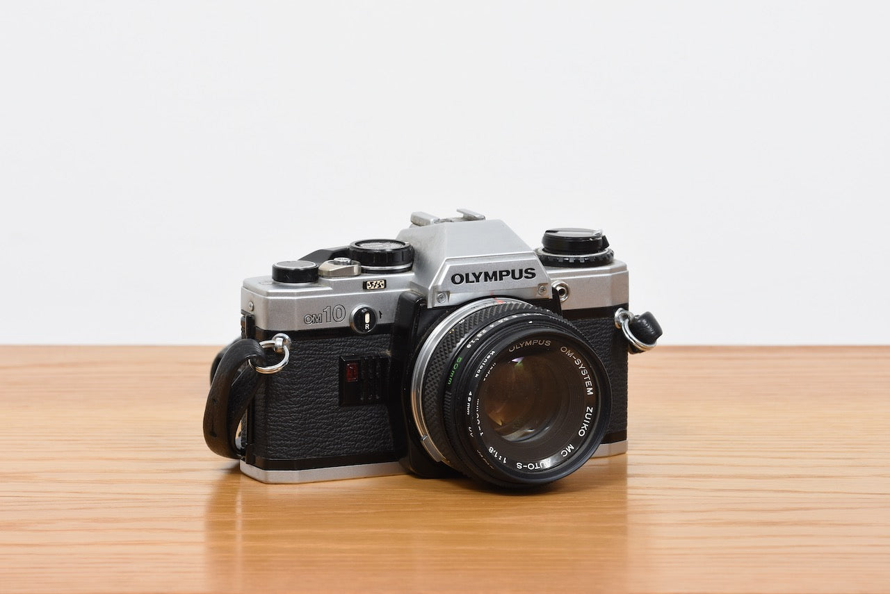 1970s OM10 camera + lenses by Olympus