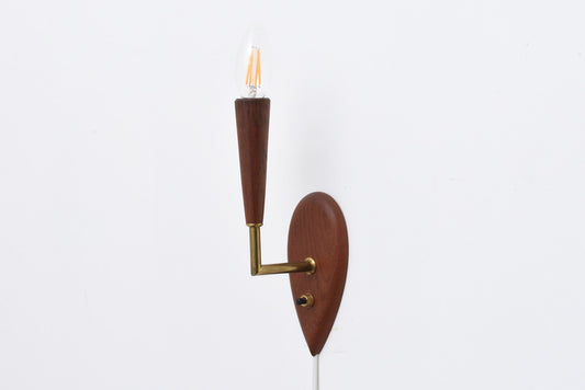 Teak wall light with brass detail