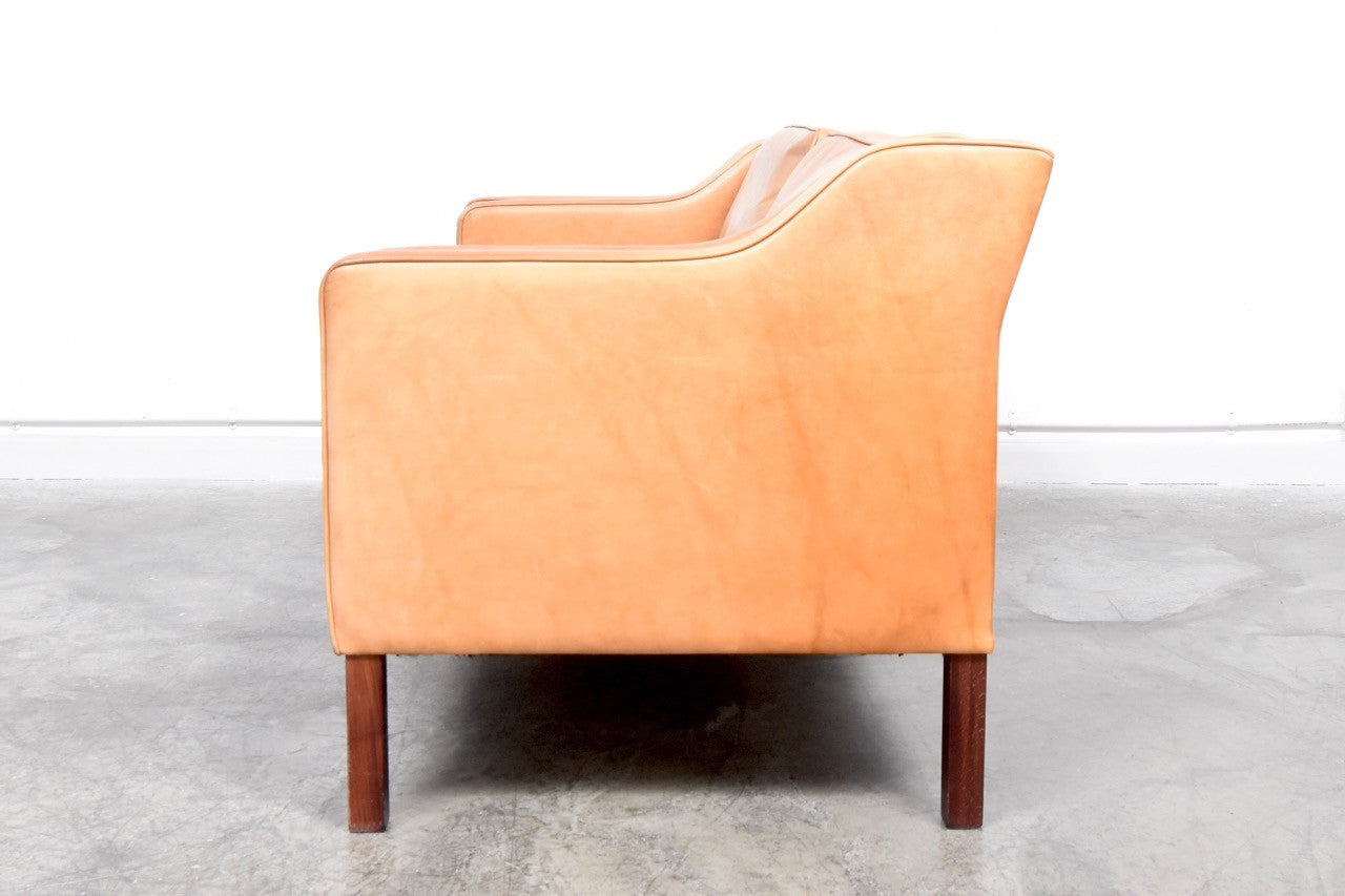 Two seat tan leather sofa