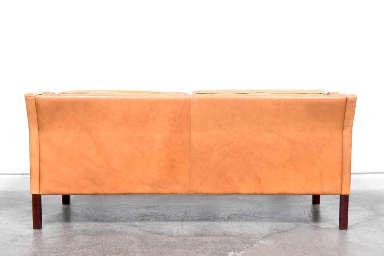 Two seat tan leather sofa