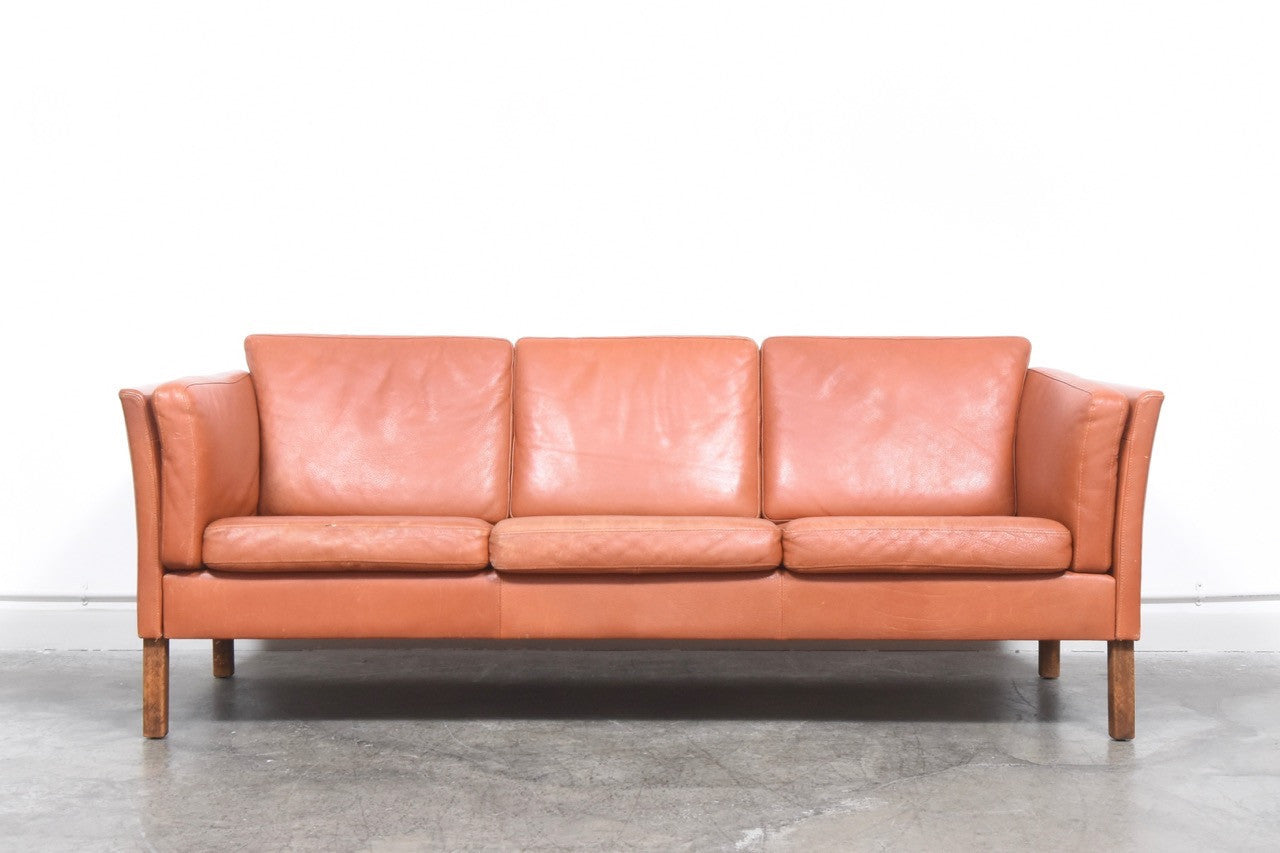Three seat sofa in cognac leather