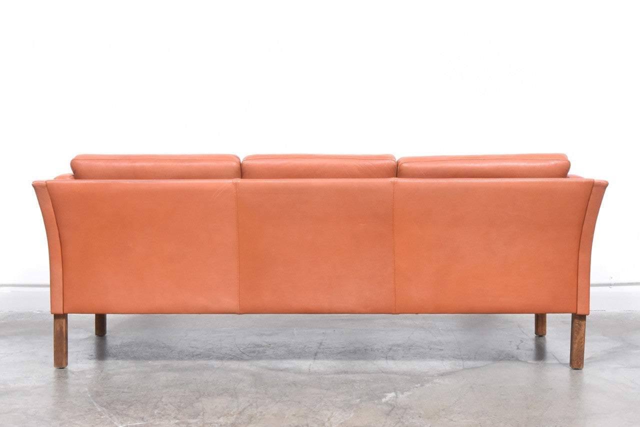 Three seat sofa in cognac leather