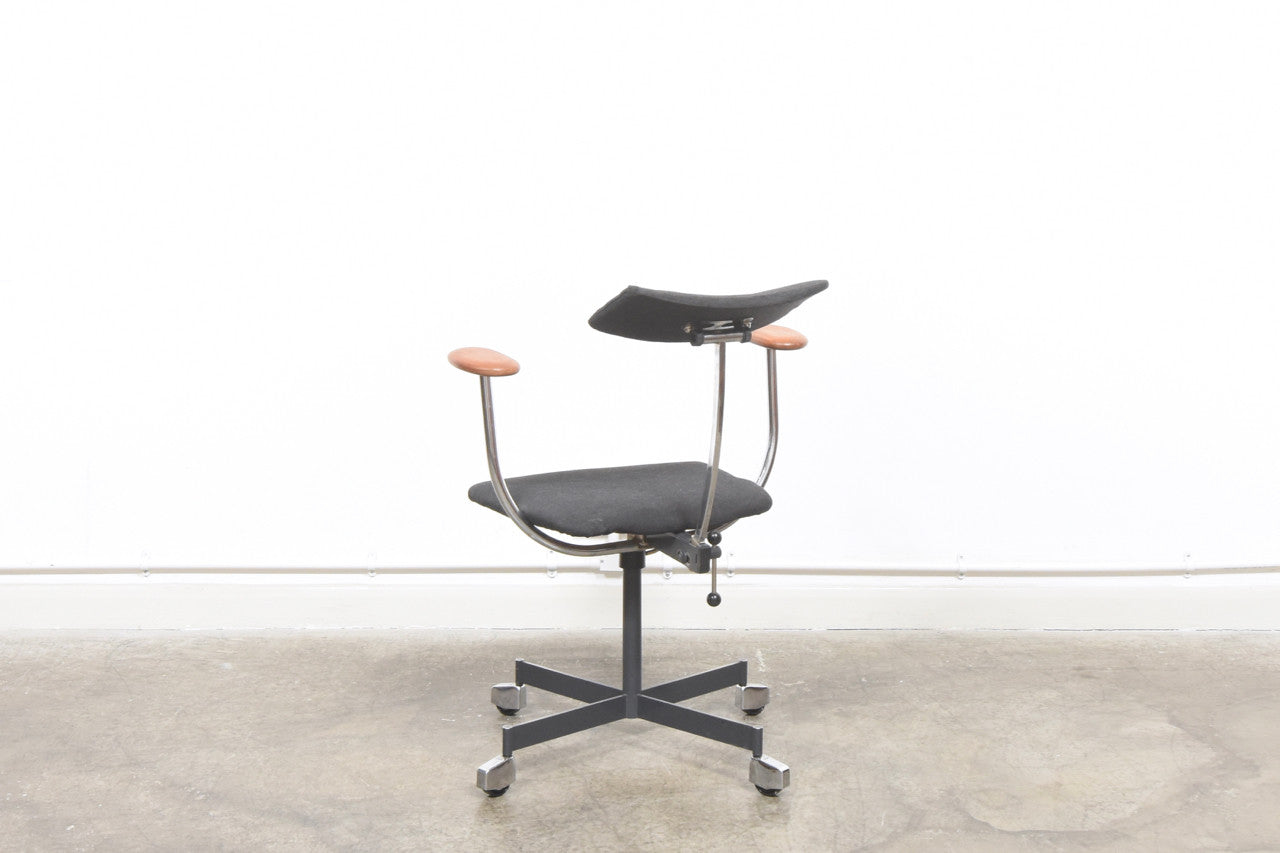 Task chair with teak arms by KEVI