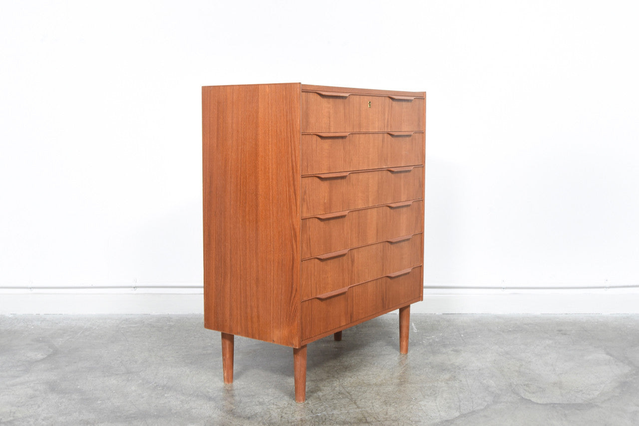 Teak chest of drawers with lipped handles