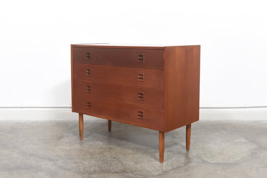 Short chest of four drawers with inset handles