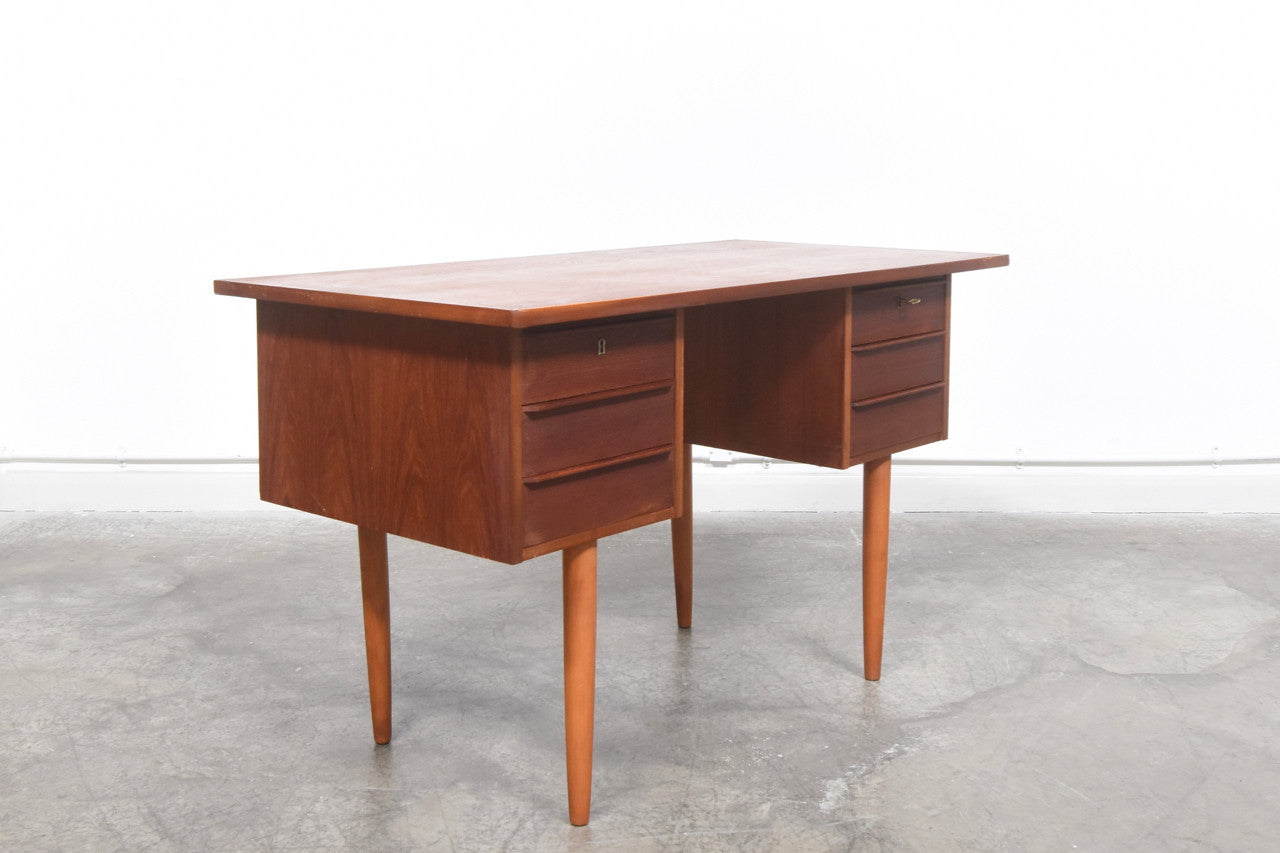 Twin pedestal desk in teak